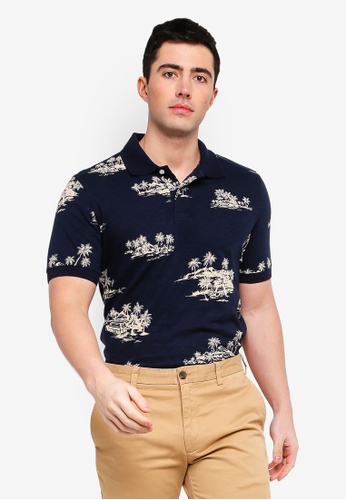 camisa polo dentro da calça